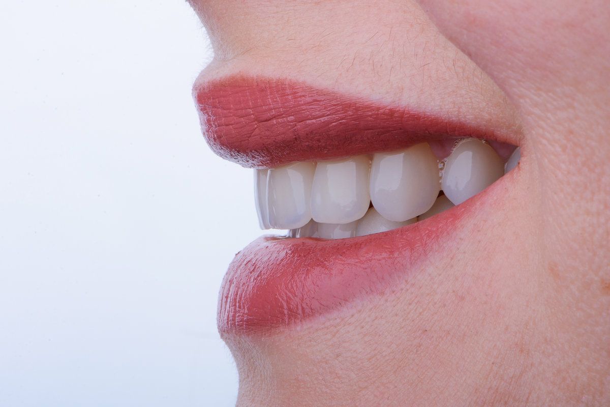 Close-up of smiling lips and teeth